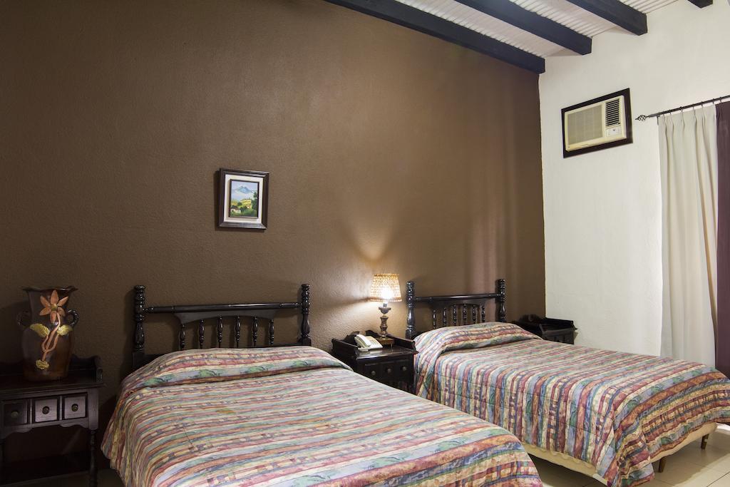 Hotel Posada De Don Jose Retalhuleu Quarto foto
