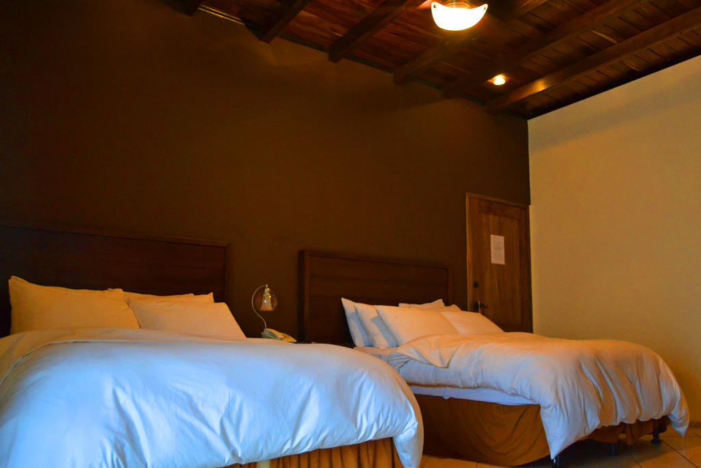 Hotel Posada De Don Jose Retalhuleu Quarto foto